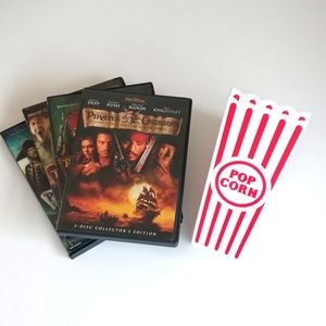 Set of 4 Pirates Of The Caribbean DVDS with Set of 2 New Popcorn Containers